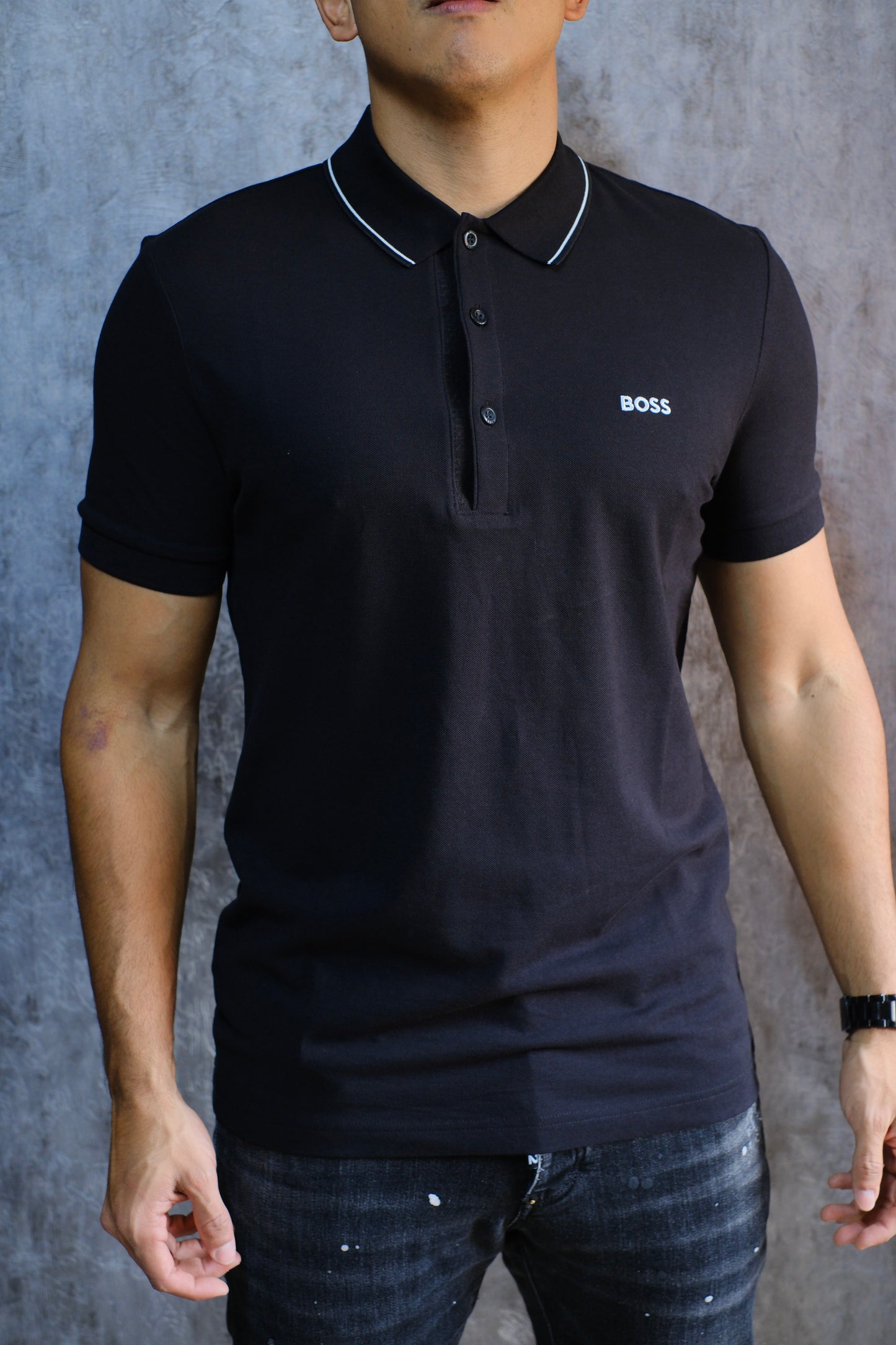Polo HUG Negra Logo Blanco