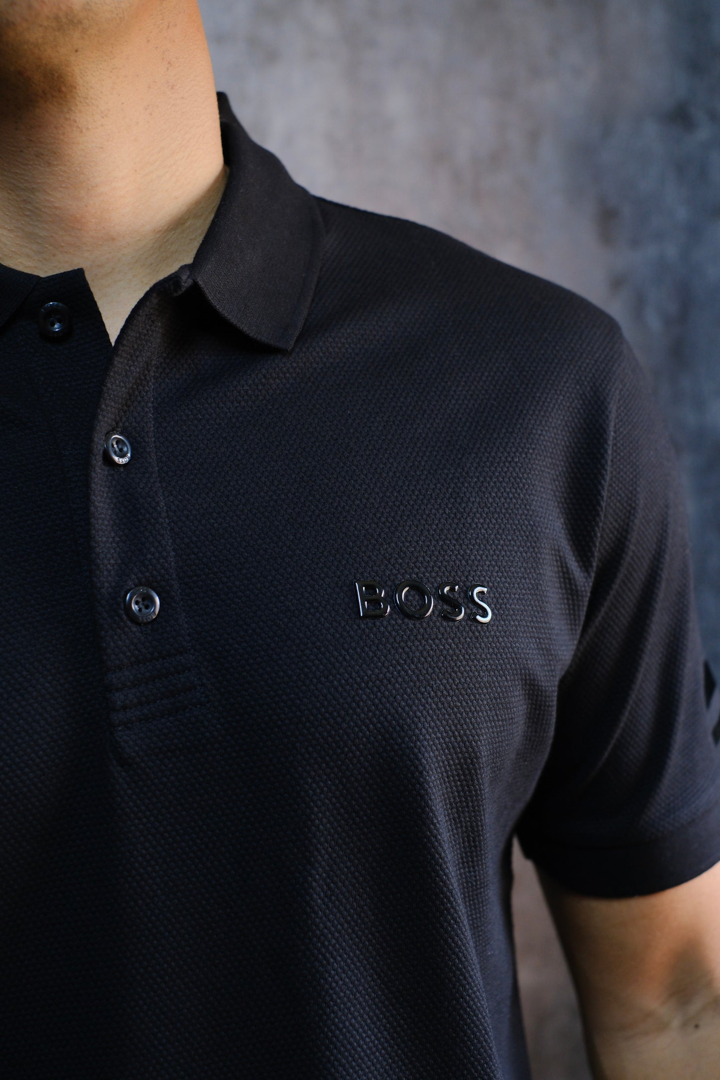 Polo HUG Negra Logo Brillante