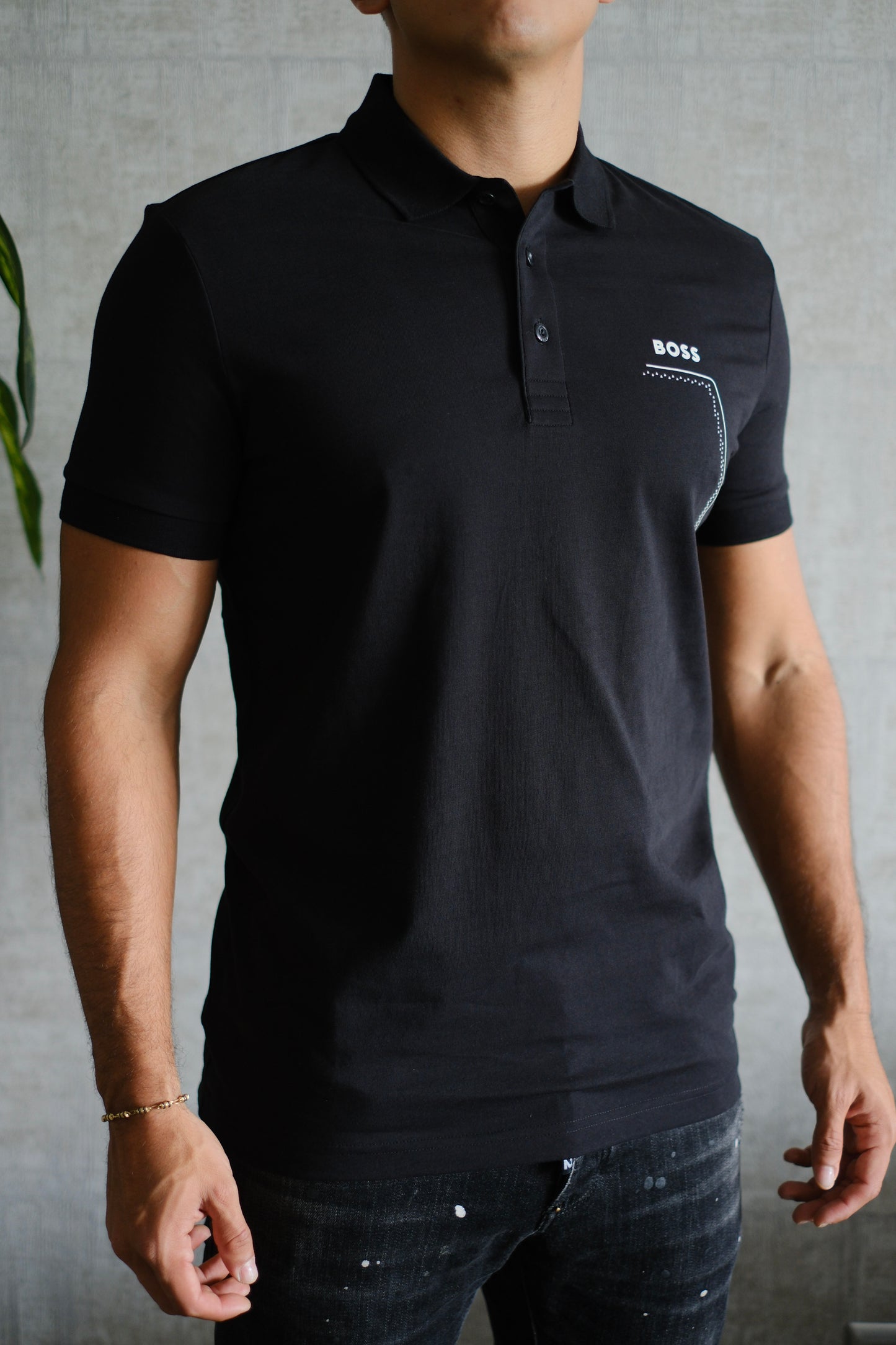 Polo HUG Negra Logo Blanco