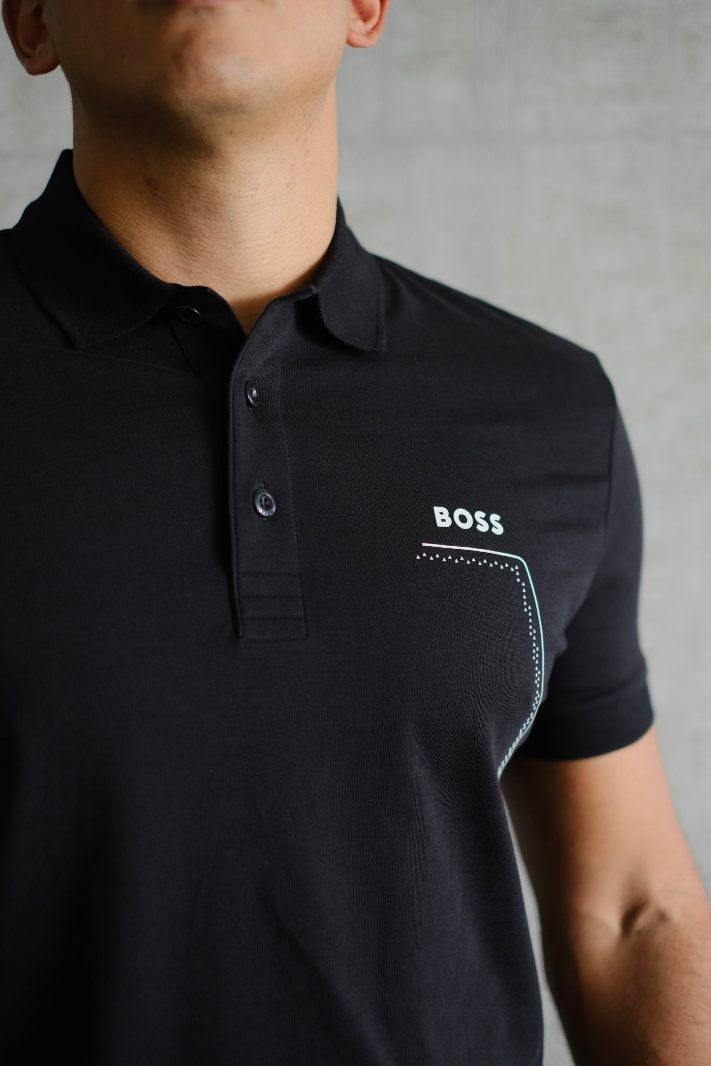 Polo HUG Negra Logo Blanco