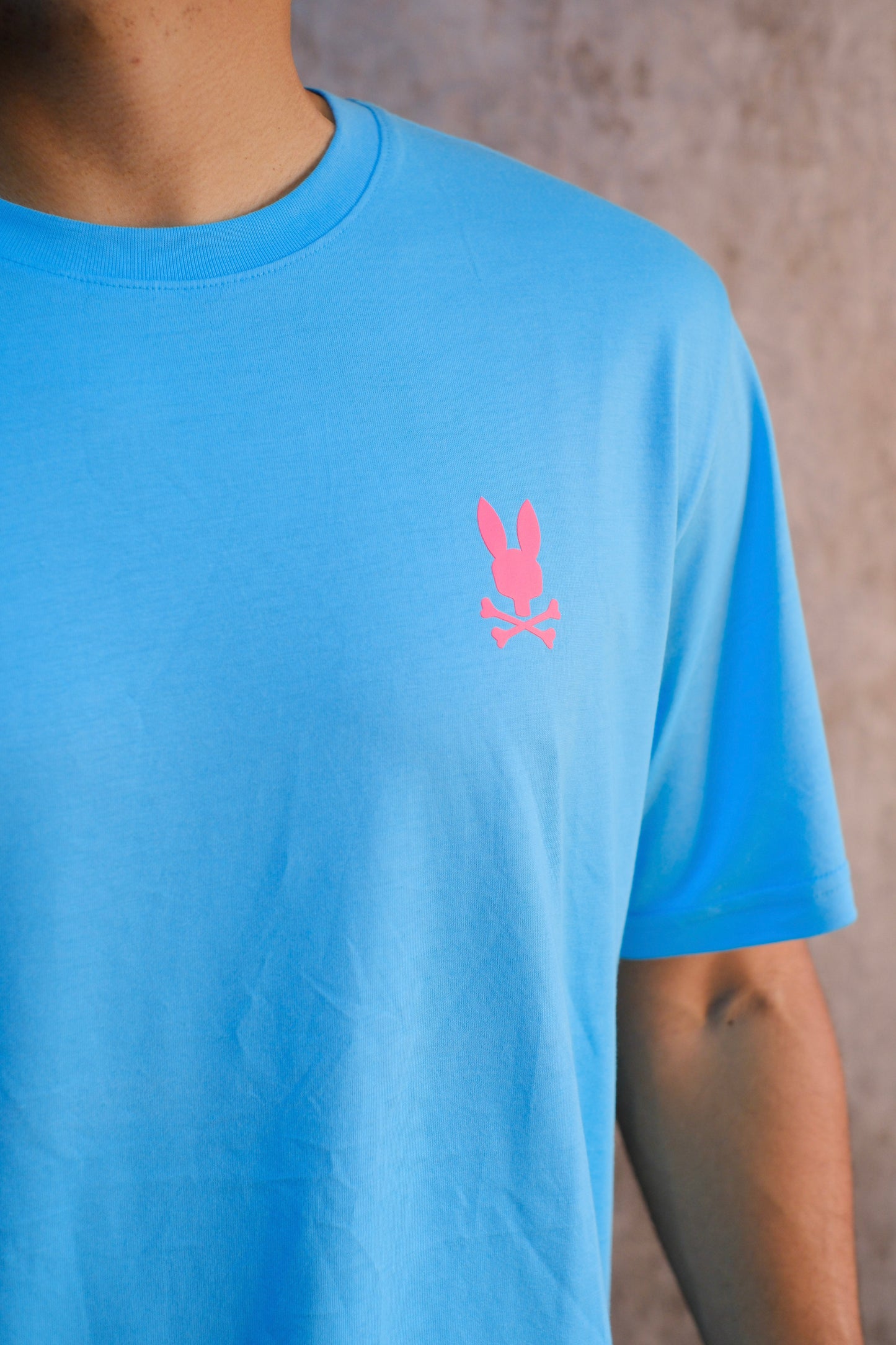 Camiseta PSY Azul Logo Naranja