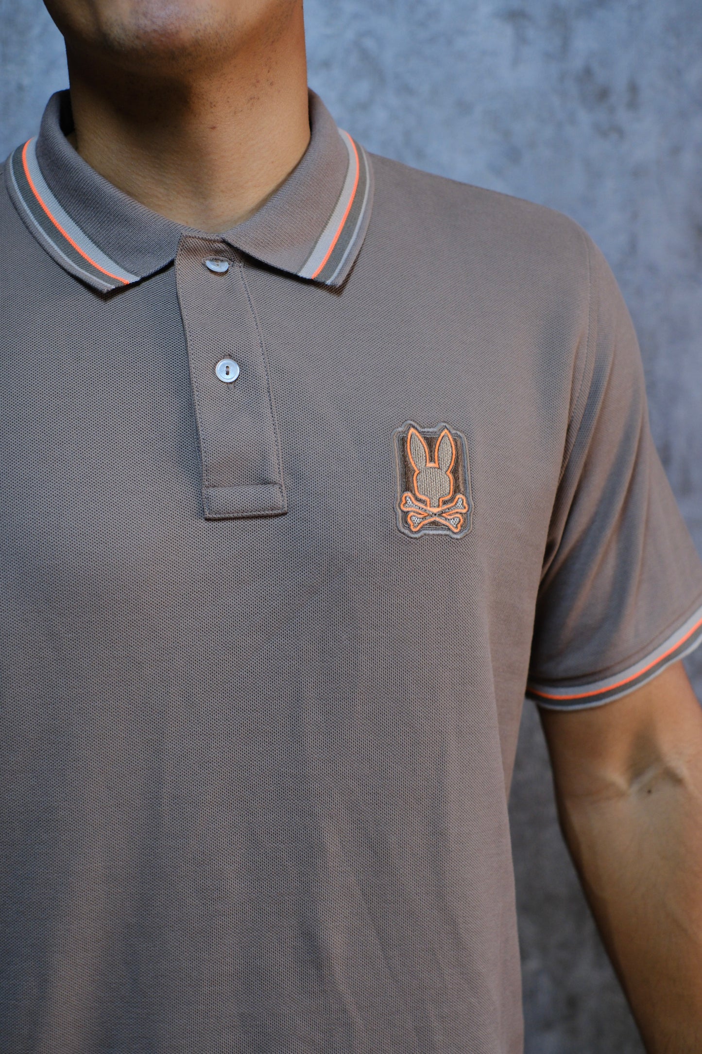 Polo PSY Beige Linea Naranja