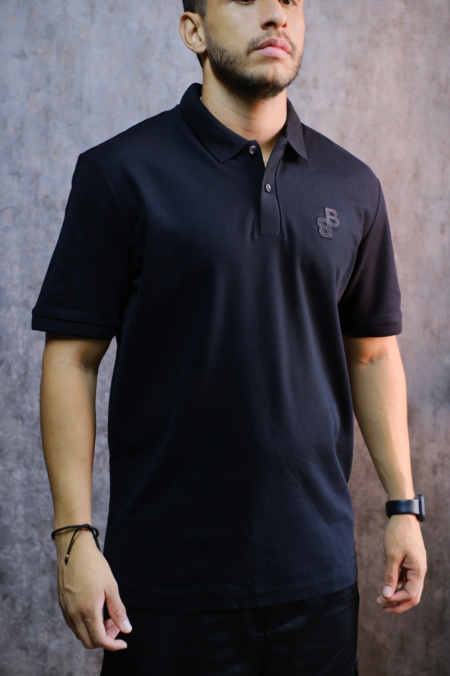 Polo HUG negra letra