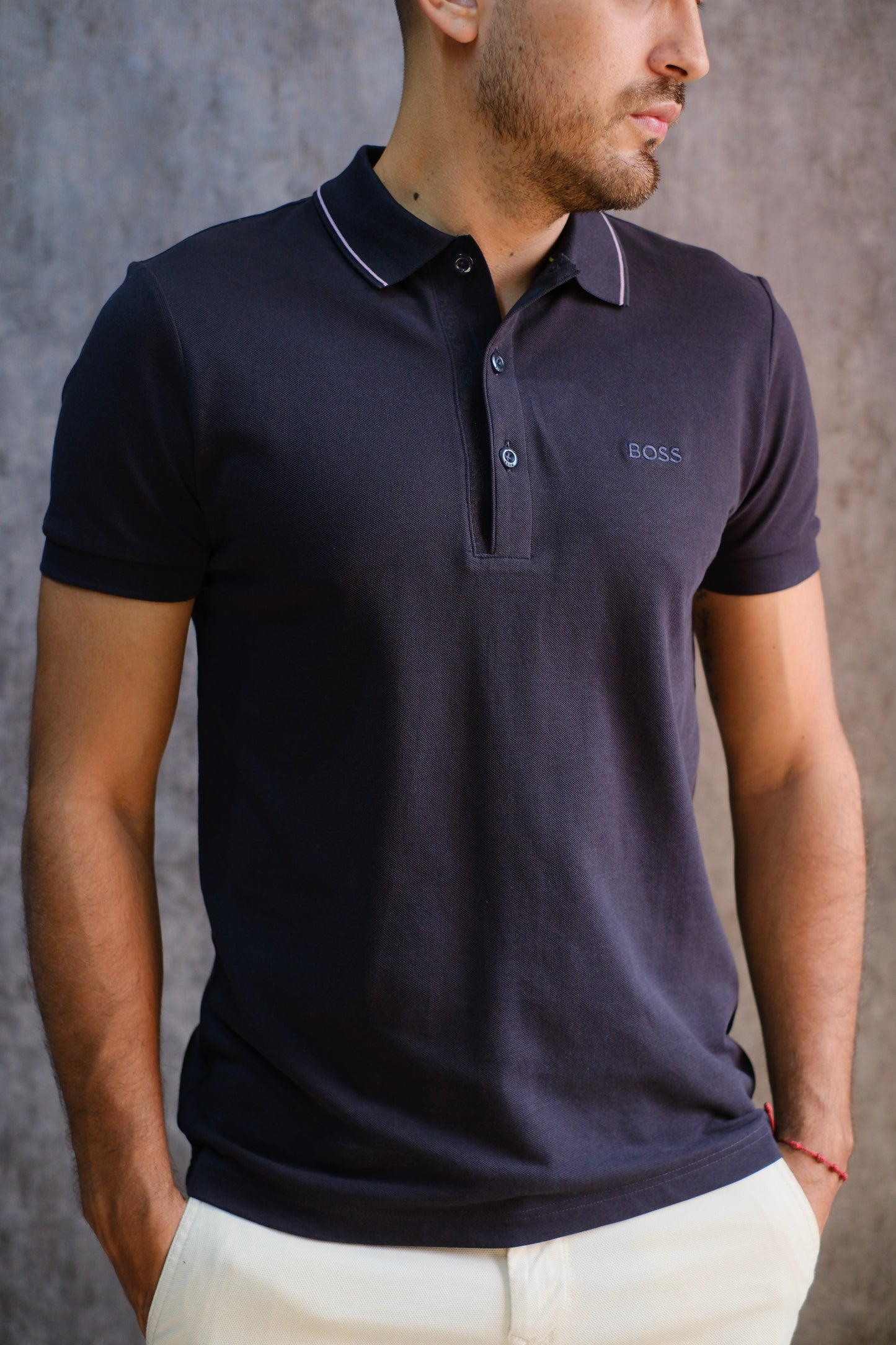Polo HUG Negra Lineas Rosa