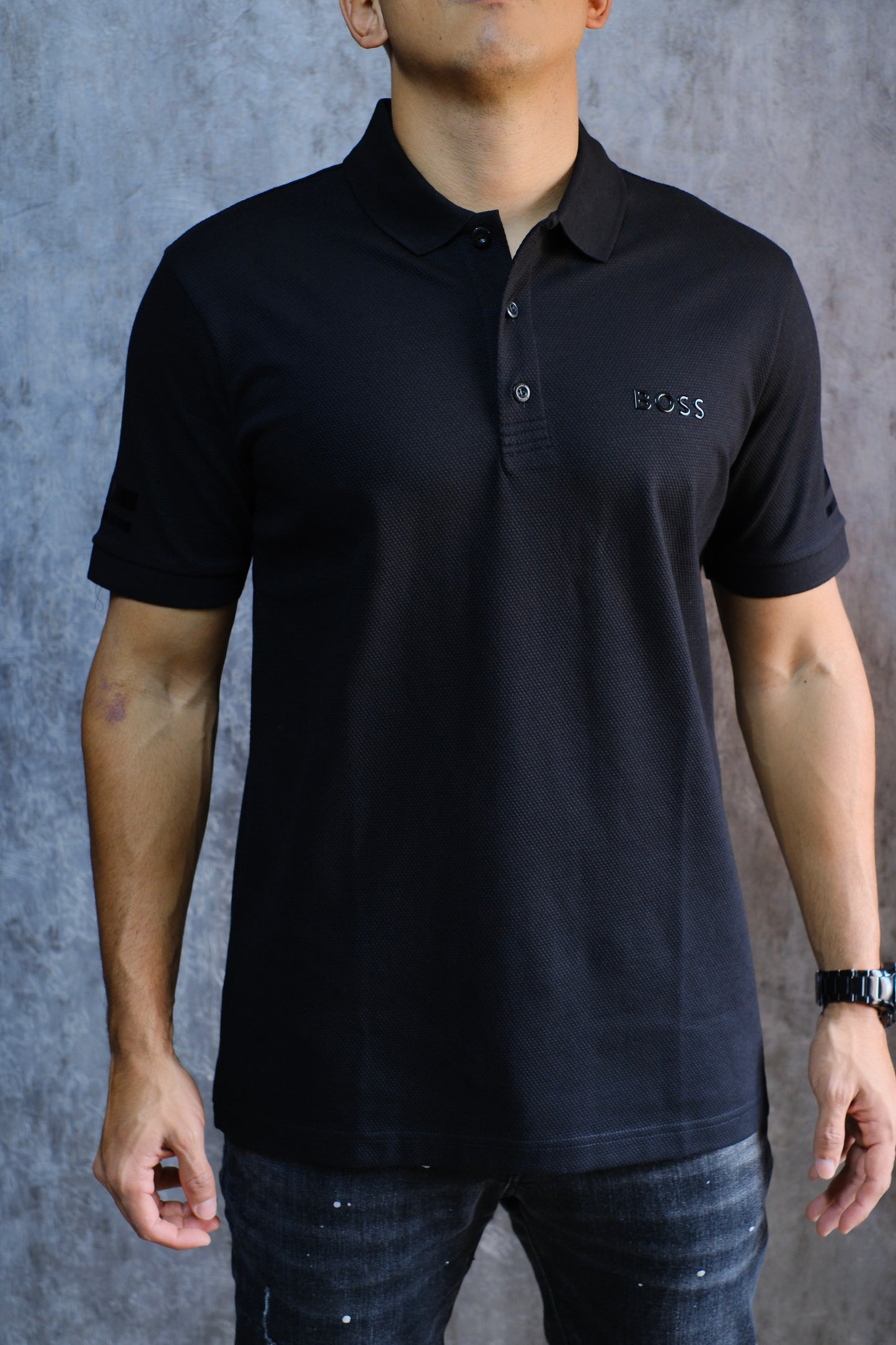 Polo HUG Negra Logo Brillante