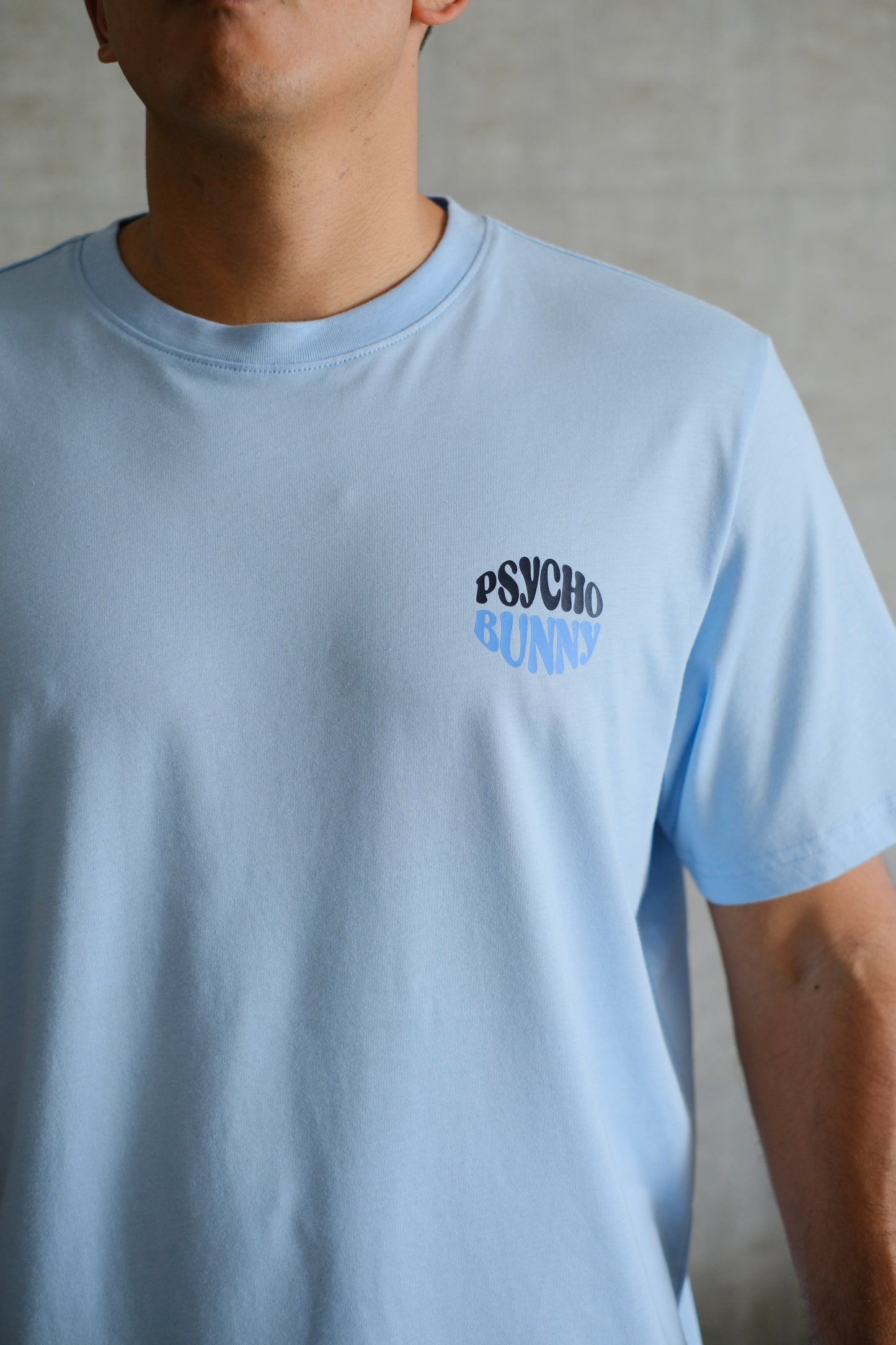 Camiseta PSY Azul Claro Logo Negro con Azul