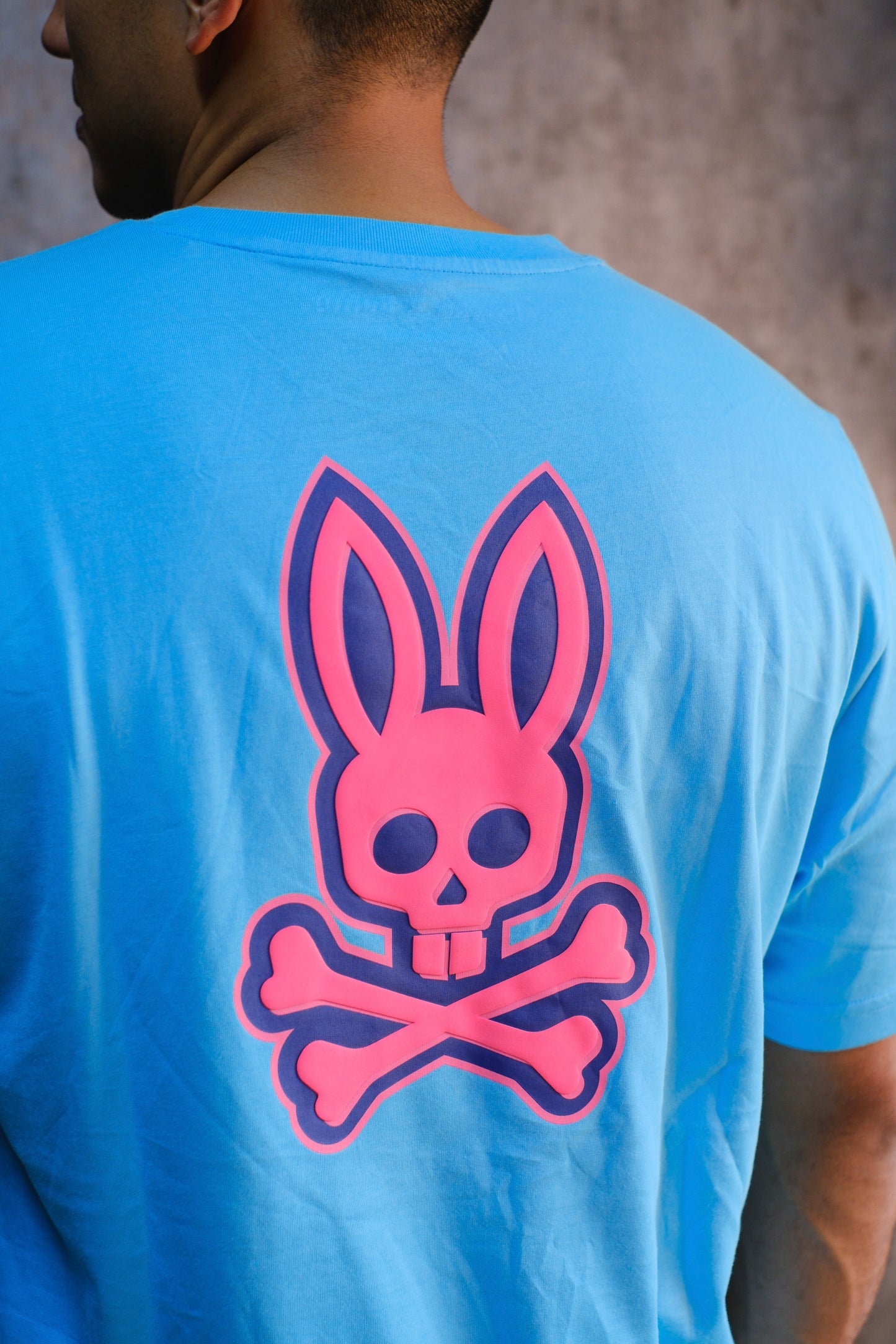 Camiseta PSY Azul Logo Naranja