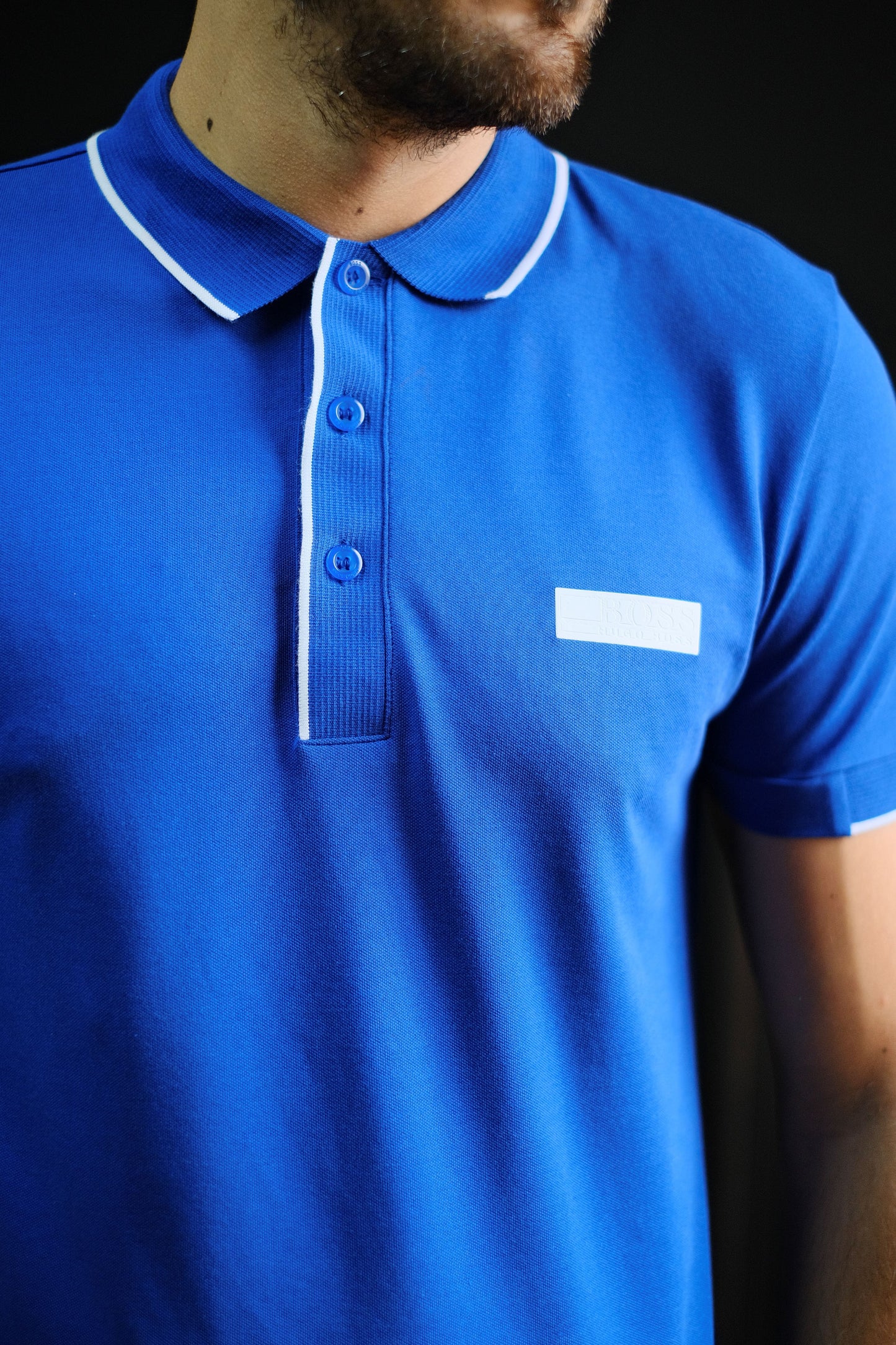 Polo HUG Azul Logo Blanco