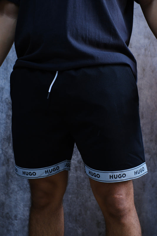 PANTALONETA HUG NEGRA 2026